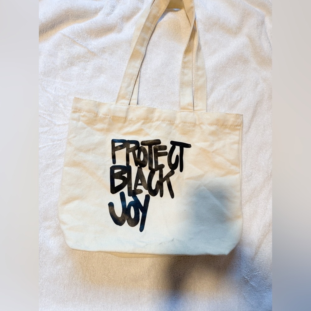 NWOT PROTECT BLACK JOY CANVAS TOTE